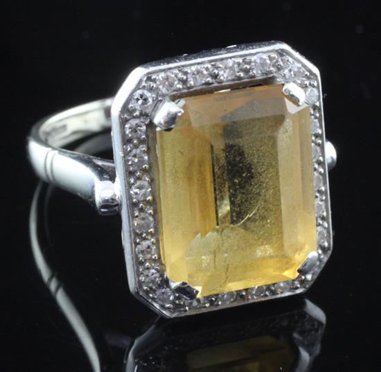 A modern 18ct white gold, citrine and diamond dress ring, size O.